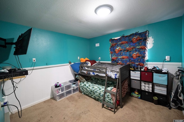 108 Cherokee Ct, Evanston, WY 82930 - bedroom with carpet floors and a textured ceiling