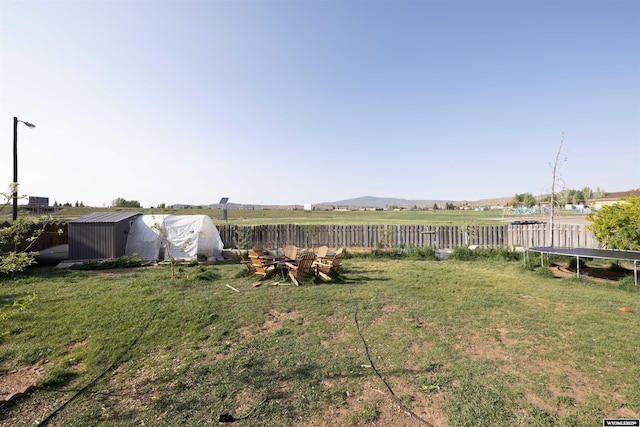 108 Cherokee Ct, Evanston, WY 82930 - view of yard with a trampoline
