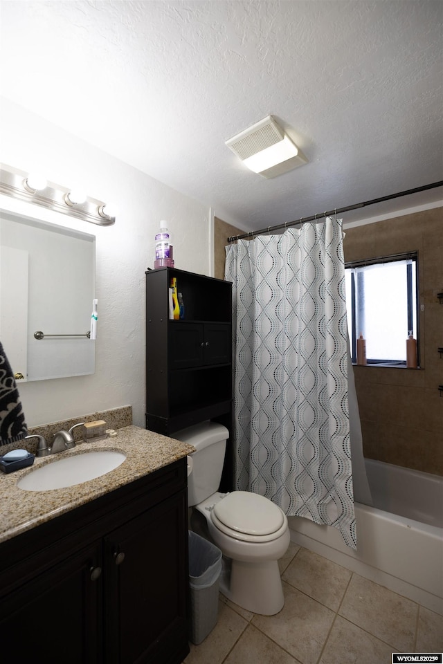 108 Cherokee Ct, Evanston, WY 82930 - bathroom featuring vanity, toilet, tile patterned floors, shower / tub combo with curtain, and a textured ceiling