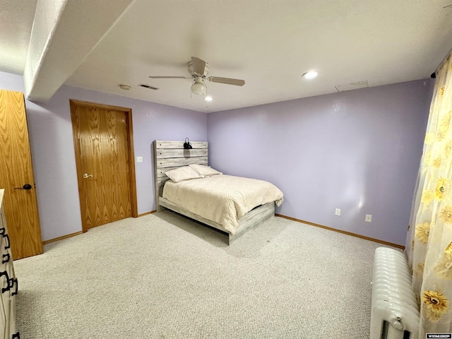920 Laramie St, Rock Springs, WY 82901 - carpeted bedroom featuring radiator, baseboards, ceiling fan, and recessed lighting