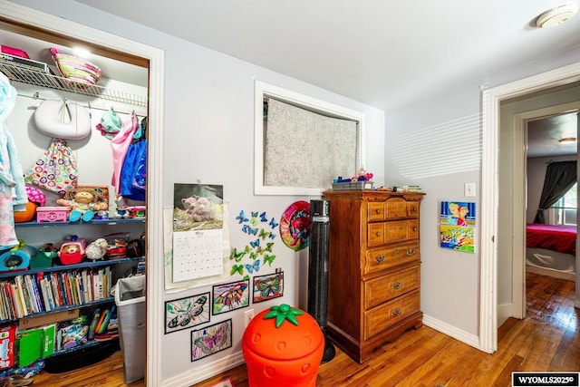 223 S Thurmond St, Sheridan, WY 82801 - game room with wood finished floors and baseboards