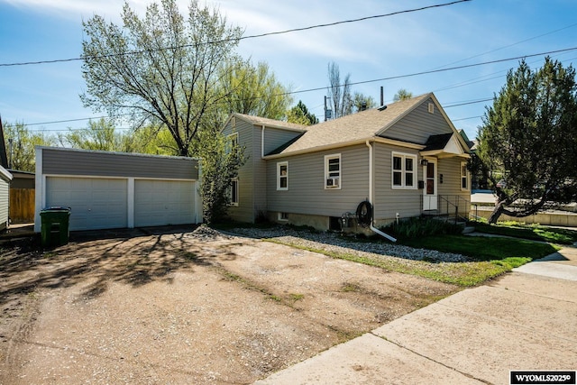 223 S Thurmond St, Sheridan, WY 82801 - view of home's exterior featuring an outbuilding and a garage