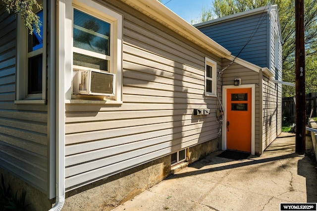 223 S Thurmond St, Sheridan, WY 82801 - view of side of home with fence and cooling unit