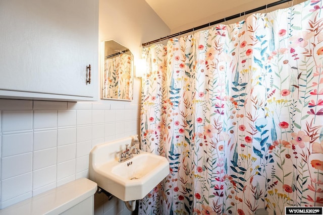 223 S Thurmond St, Sheridan, WY 82801 - bathroom featuring tile walls, a sink, and toilet