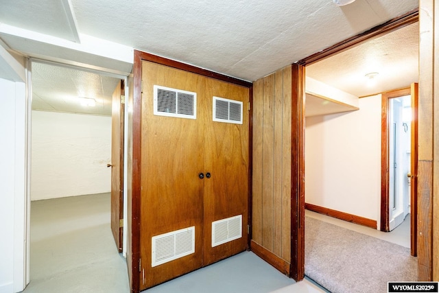 223 S Thurmond St, Sheridan, WY 82801 - hall with a textured ceiling
