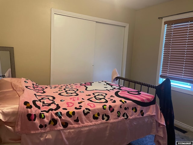 1612 Idaho St, Rawlins, WY 82301 - bedroom featuring a closet and carpet