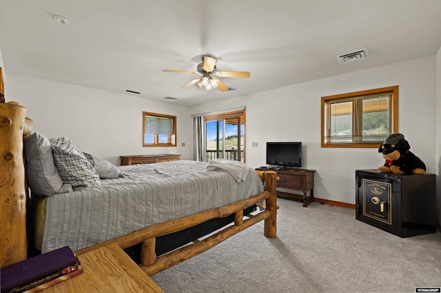 carpeted bedroom featuring access to exterior, baseboards, and ceiling fan