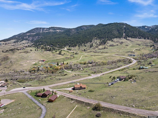 view of property location featuring mountains and rural landscape