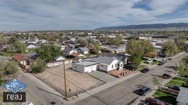 aerial view of residential area with a mountainous background