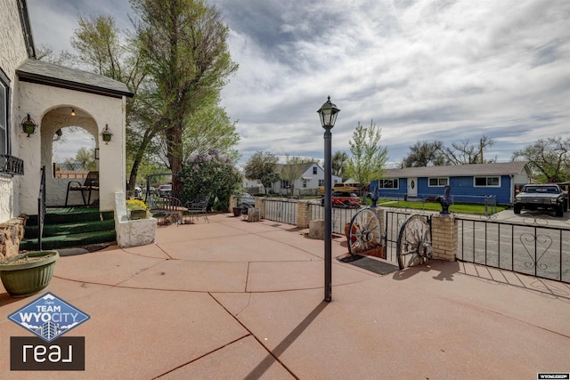 view of patio with a residential view