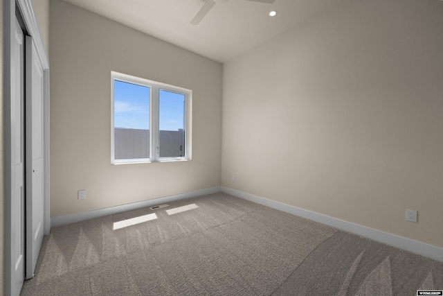 unfurnished bedroom featuring carpet flooring, baseboards, and recessed lighting