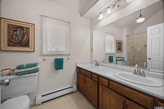 full bath featuring a baseboard heating unit, toilet, tile patterned flooring, double vanity, and lofted ceiling