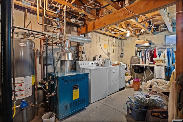 unfinished basement featuring washer and clothes dryer, water heater, and a heating unit