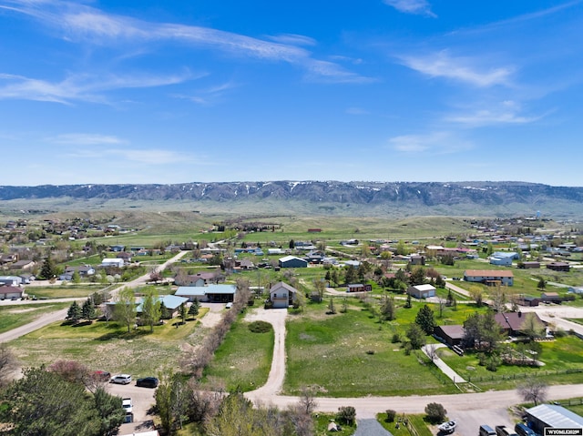 aerial view of residential area with a mountainous background