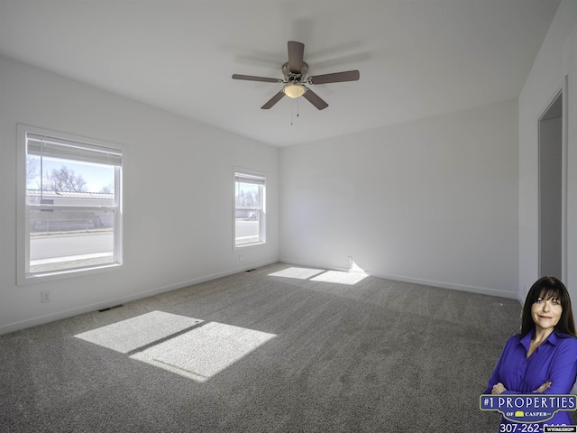 430 W Platte, Glenrock, WY 82637 - spare room with carpet flooring, a ceiling fan, and baseboards