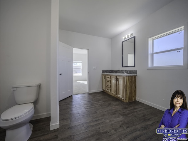 430 W Platte, Glenrock, WY 82637 - bathroom with plenty of natural light, baseboards, and wood finished floors