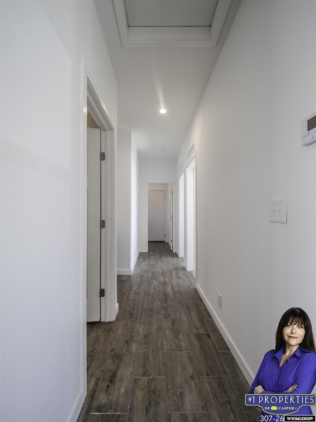 430 W Platte, Glenrock, WY 82637 - corridor with baseboards and dark wood-type flooring