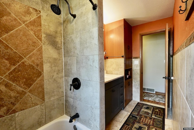 bathroom with shower / bath combination and vanity
