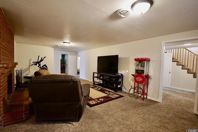 carpeted living room featuring stairway, baseboards, a fireplace, and a textured ceiling
