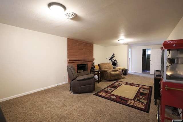 living room featuring carpet floors, a brick fireplace, baseboards, and a textured ceiling