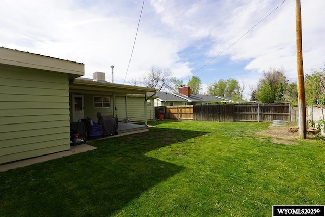 view of yard with central AC
