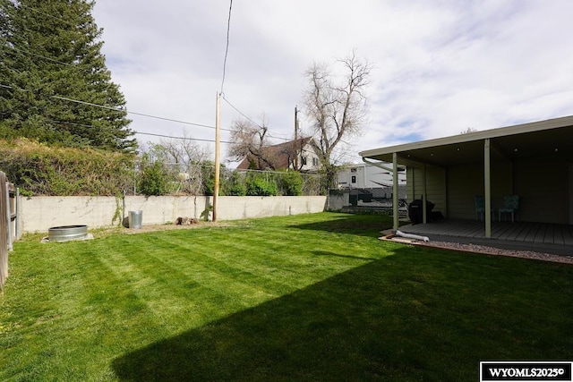 view of yard featuring a wooden deck