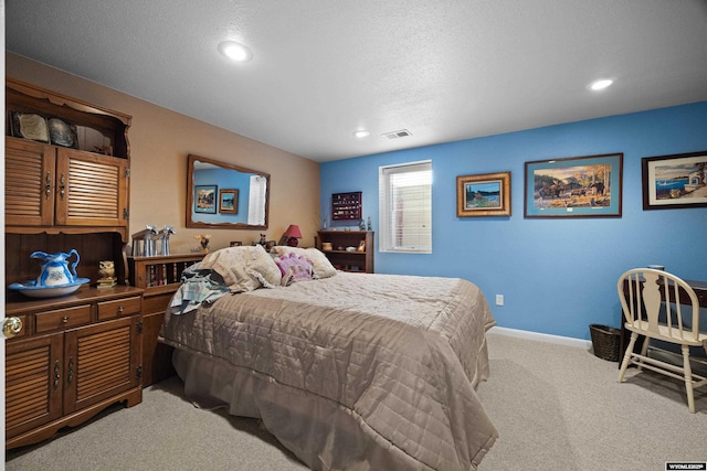 bedroom with carpet, baseboards, and recessed lighting