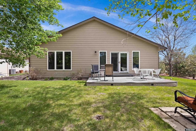 back of house with a patio area and a yard