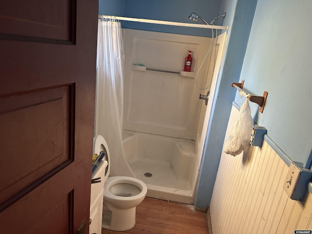 219 W Franklin St, Morrill, NE 69358 - full bath with a shower stall, wood finished floors, and toilet