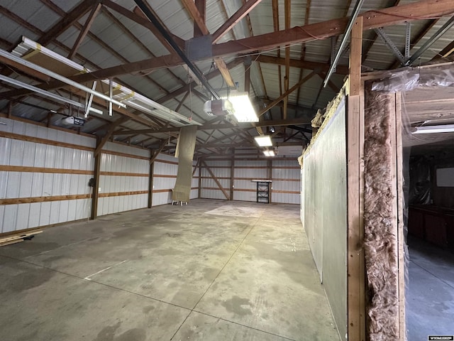 219 W Franklin St, Morrill, NE 69358 - garage featuring a garage door opener and metal wall
