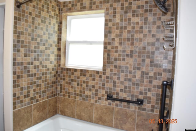 bathroom featuring shower / washtub combination