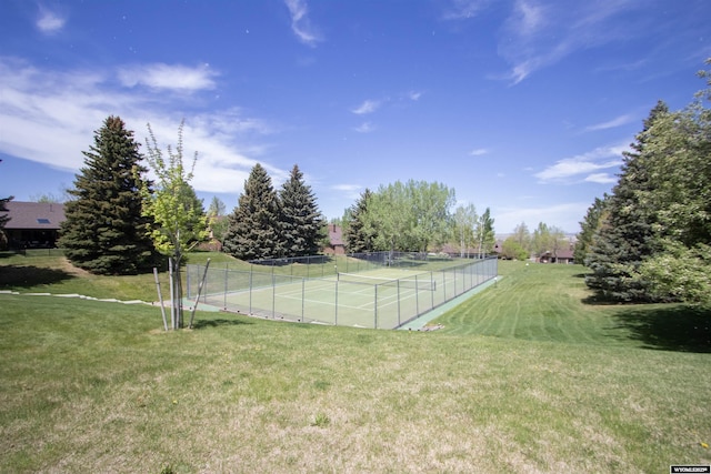 view of yard featuring a tennis court