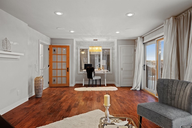 living area with a desk, baseboards, recessed lighting, and wood finished floors