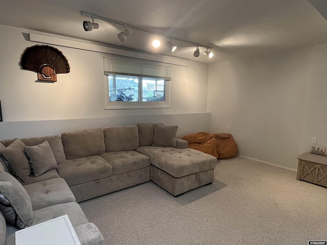 2715 Colorado Dr, Green River, WY 82935 - living area with rail lighting, carpet, and baseboards