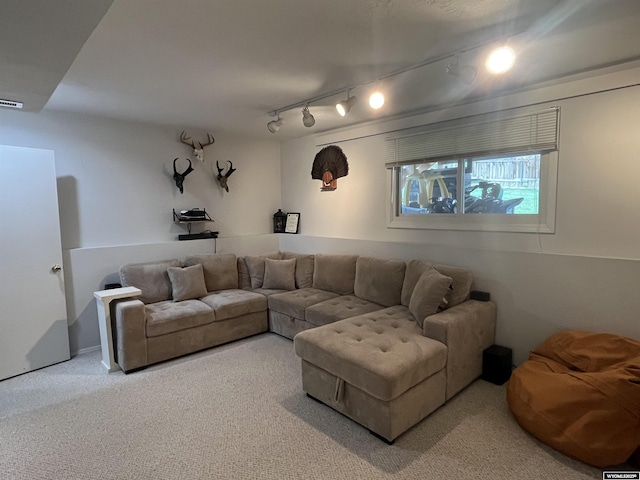 2715 Colorado Dr, Green River, WY 82935 - carpeted living room with track lighting