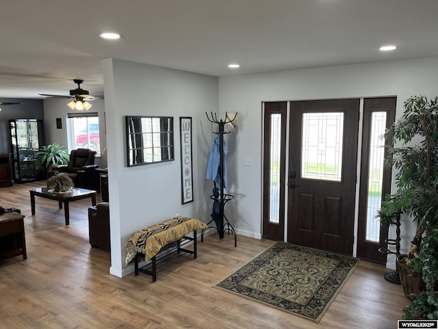 entryway with recessed lighting, a ceiling fan, and wood finished floors