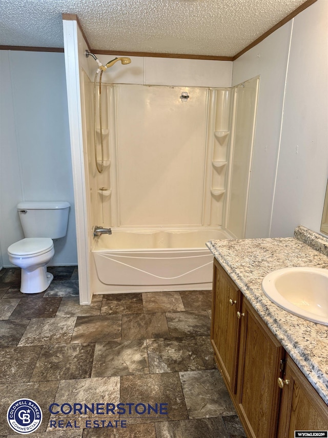 full bath featuring a textured ceiling, toilet, vanity, crown molding, and tub / shower combination