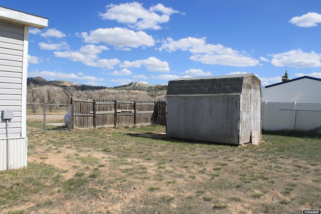 7 N Schmid Dr, La Barge, WY 83123 - view of yard with a shed, a mountain view, and an outbuilding