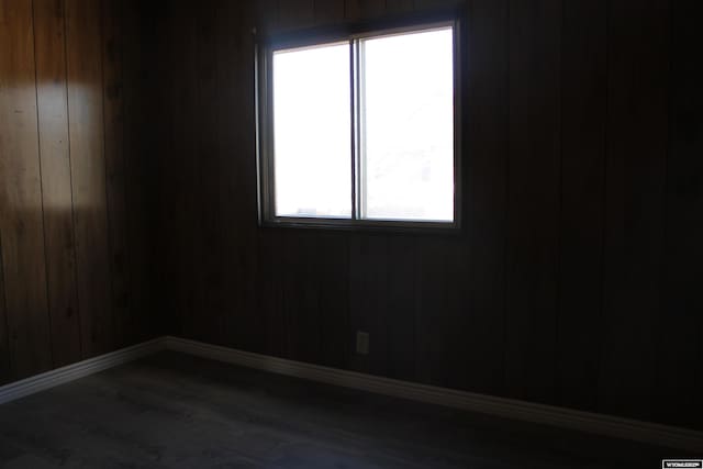 7 N Schmid Dr, La Barge, WY 83123 - unfurnished room with baseboards and wood finished floors