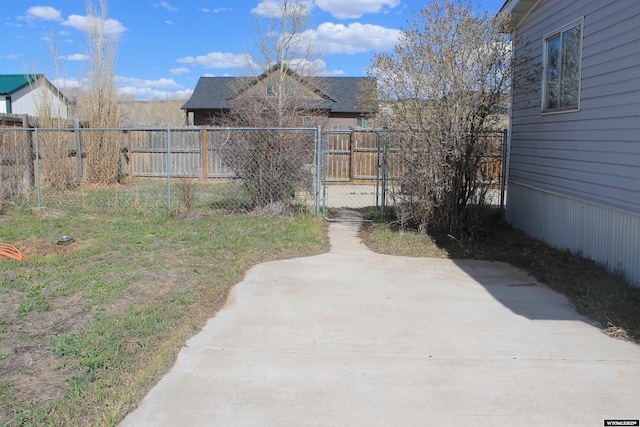 7 N Schmid Dr, La Barge, WY 83123 - view of yard with fence, a patio area, and a gate