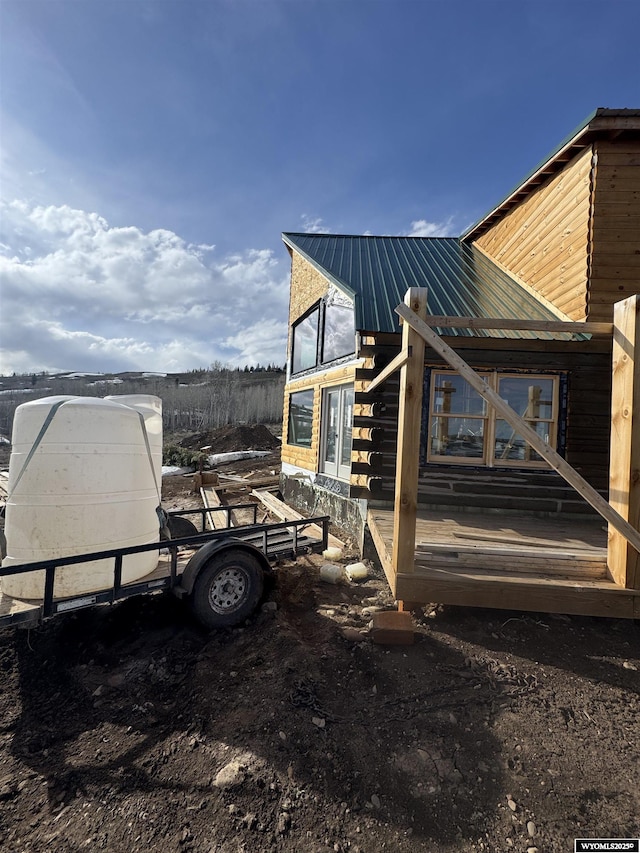 71 Sterling Dr, Daniel, WY 83115 - view of side of home with metal roof and log siding
