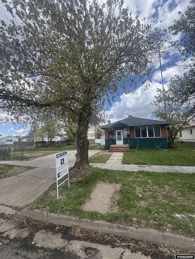 237 4th St, Evanston, WY 82930 - view of front of home with driveway