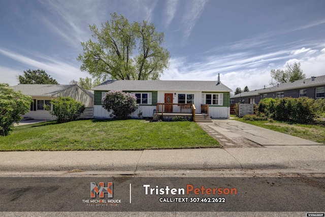 2819 E 6th St, Casper, WY 82609 - single story home with a front lawn and concrete driveway