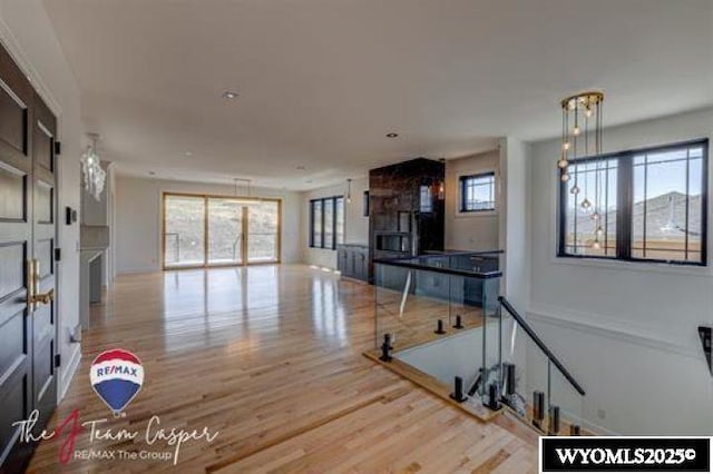 unfurnished living room featuring wood finished floors