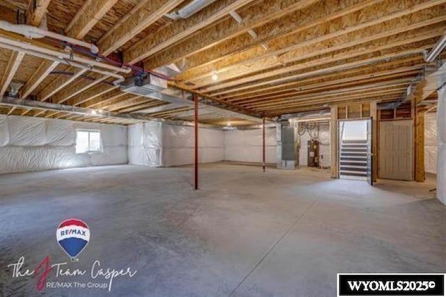 below grade area featuring strapped water heater and heating unit