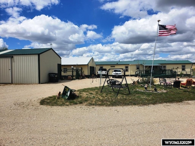 exterior space with an outbuilding