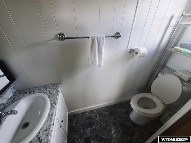 bathroom with vanity and toilet