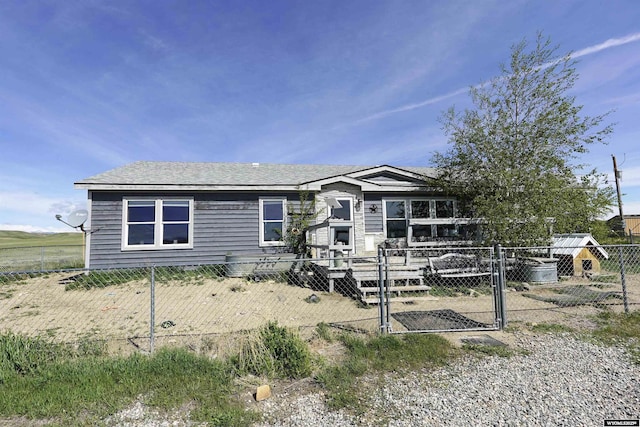33 Oxbow Rd, Buffalo, WY 82834 - view of front of house with a fenced front yard and a gate
