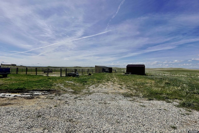 33 Oxbow Rd, Buffalo, WY 82834 - view of yard with fence, a view of countryside, and an outdoor structure