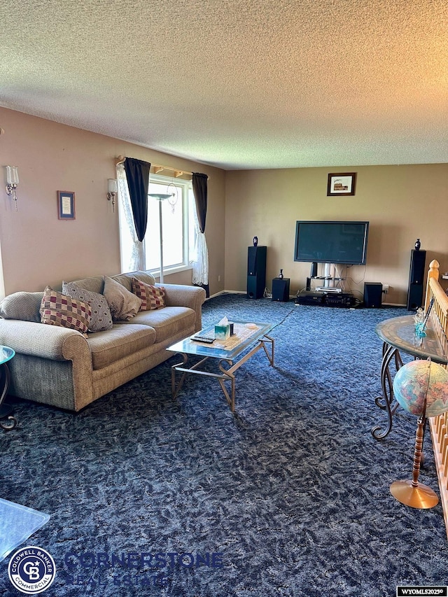 living room with carpet flooring and a textured ceiling